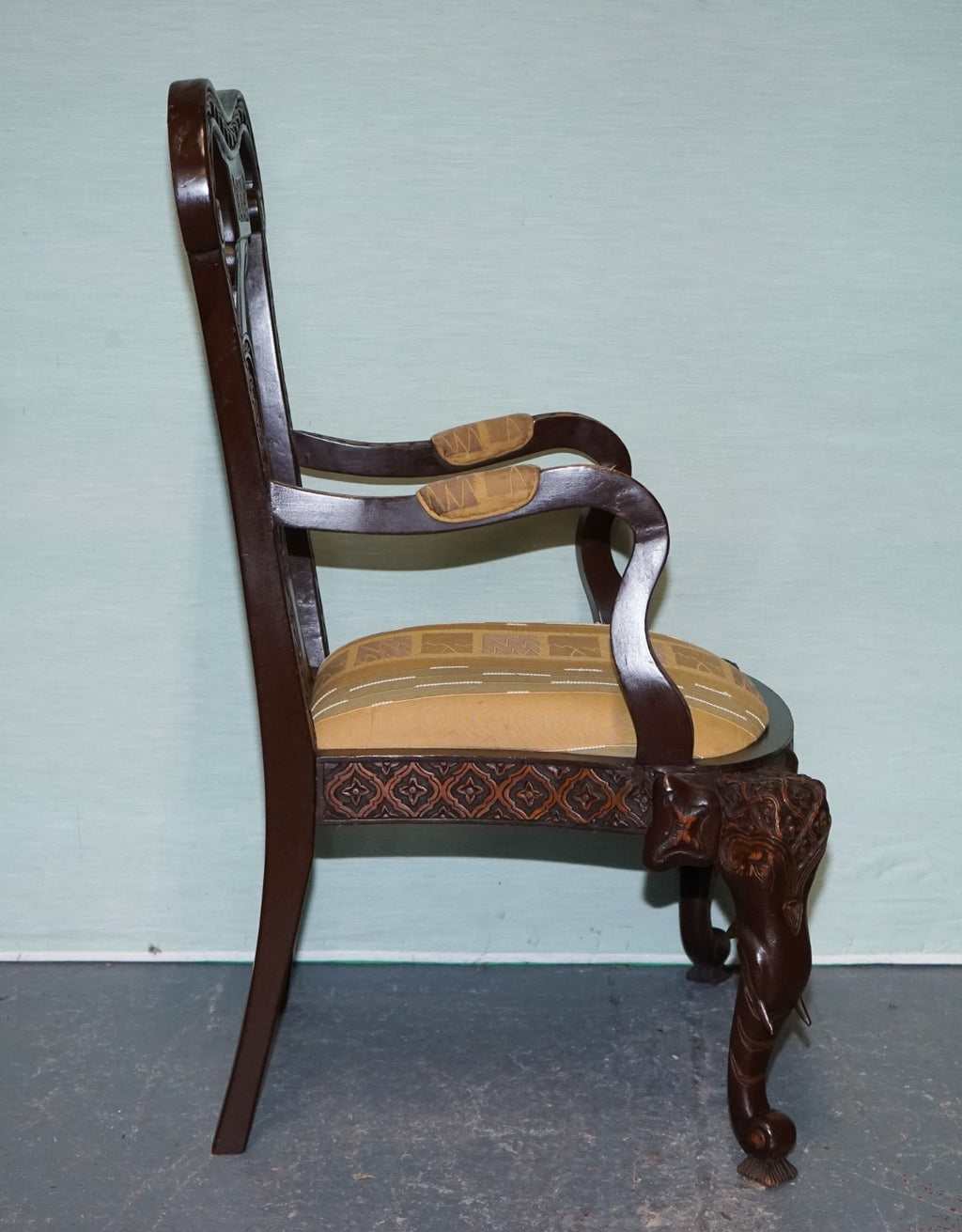 ANGLO INDIAN WOODEN HEAVILY CARVED ELEPHANT DETAIL SINGLE CAVER ARMCHAIR