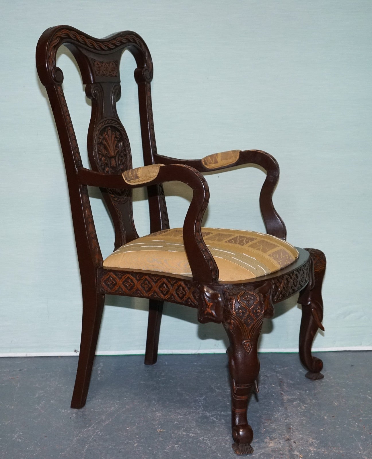 ANGLO INDIAN WOODEN HEAVILY CARVED ELEPHANT DETAIL SINGLE CAVER ARMCHAIR