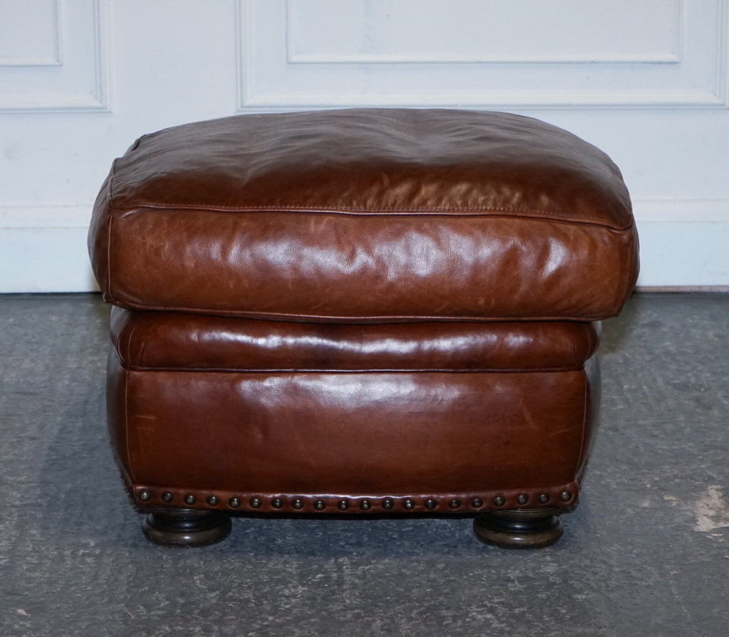 LOVELY VINTAGE BROWN LEATHER FOOTSTOOL FEATHER FILLED BRASS STUDS DETAIL