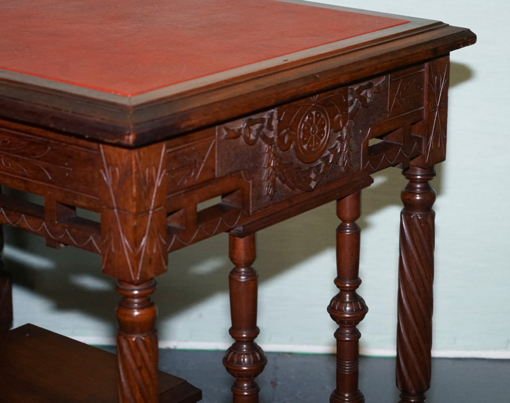 LATE 19TH CENTURY CONTINENTAL CARVED WALNUT WRITING TABLE LEATHER INLAY TOP