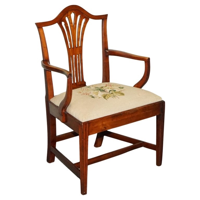 19TH CENTRY SINGLE HEPPLEWHITE ELBOW ARMCHAIR WITH FLORAL NEEDLEPOINT CUSHION