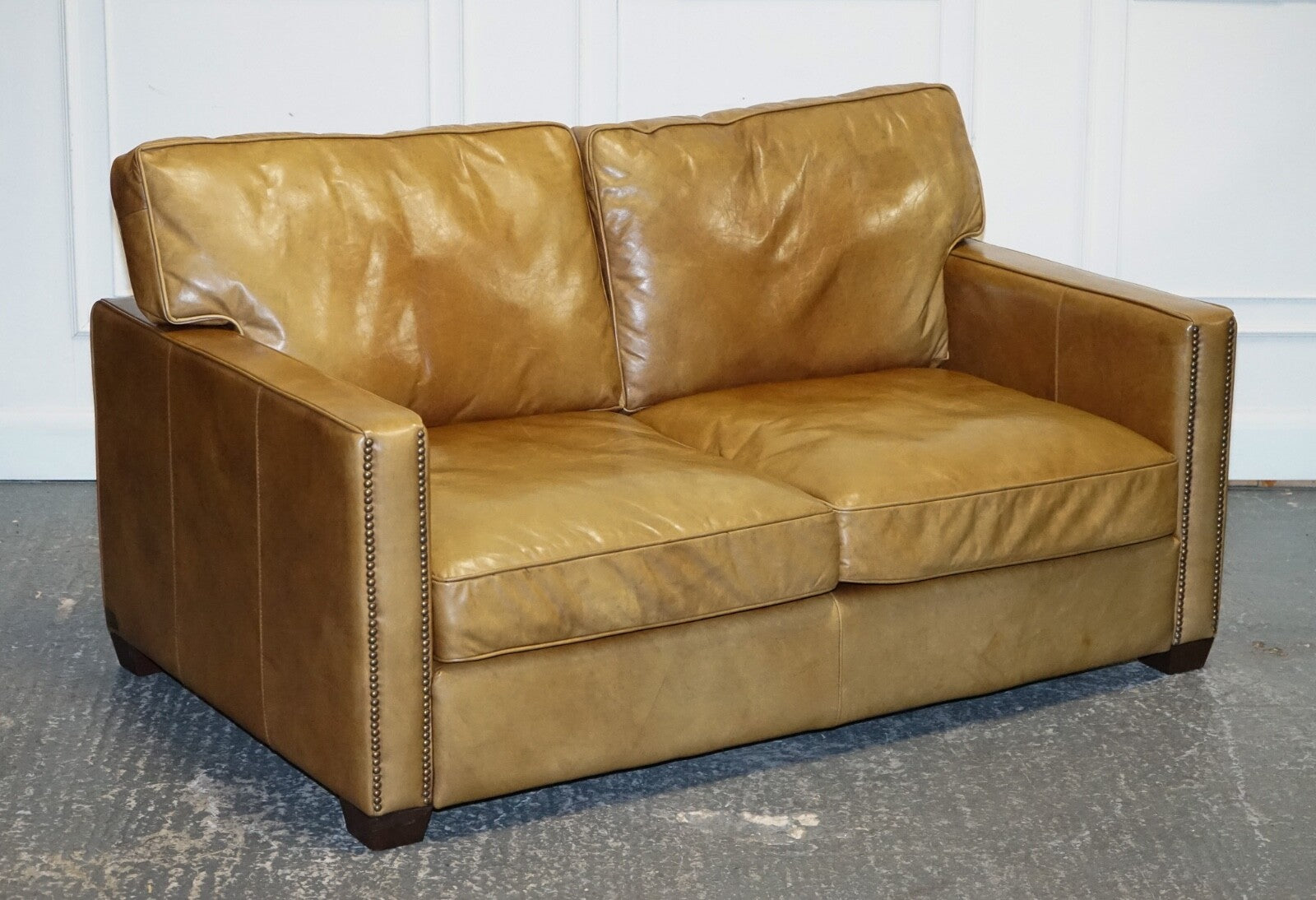 TIMOTHY OULTON HALO TWO SEATER VISCOUNT TAN LEATHER SOFA (1/2)
