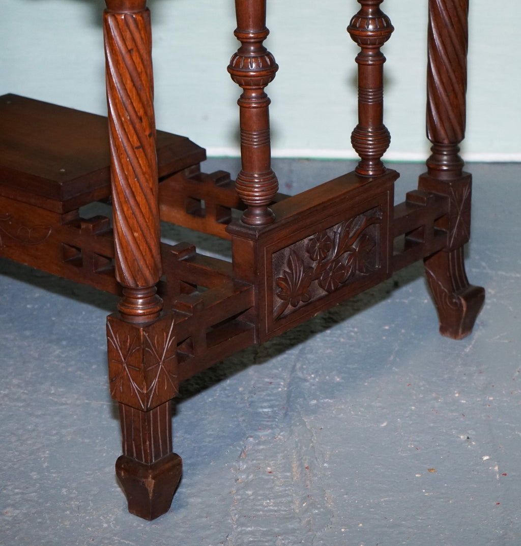 LATE 19TH CENTURY CONTINENTAL CARVED WALNUT WRITING TABLE LEATHER INLAY TOP
