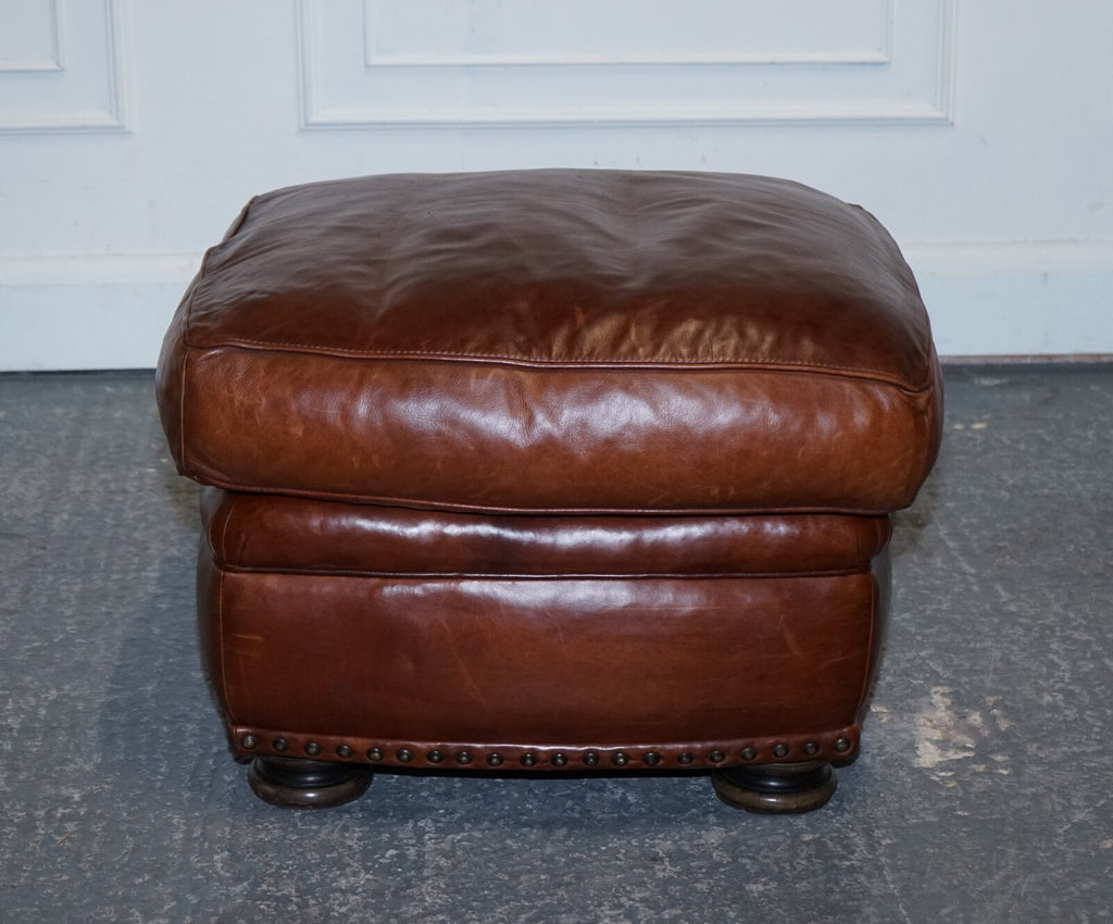 LOVELY VINTAGE BROWN LEATHER FOOTSTOOL FEATHER FILLED BRASS STUDS DETAIL
