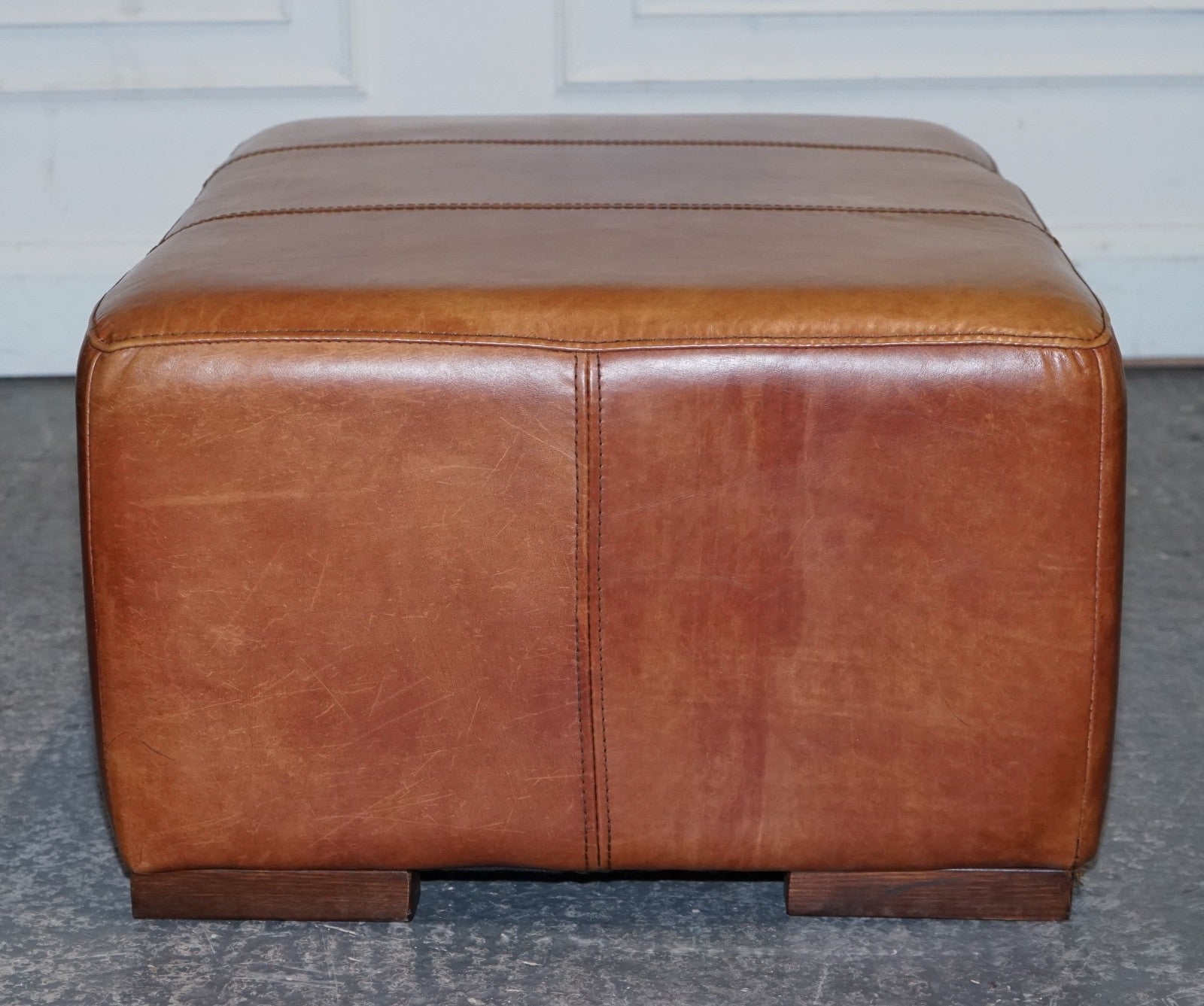 VINTAGE LARGE TAN LEATHER FOOTSTOOL OTTOMAN MADE BY HALO