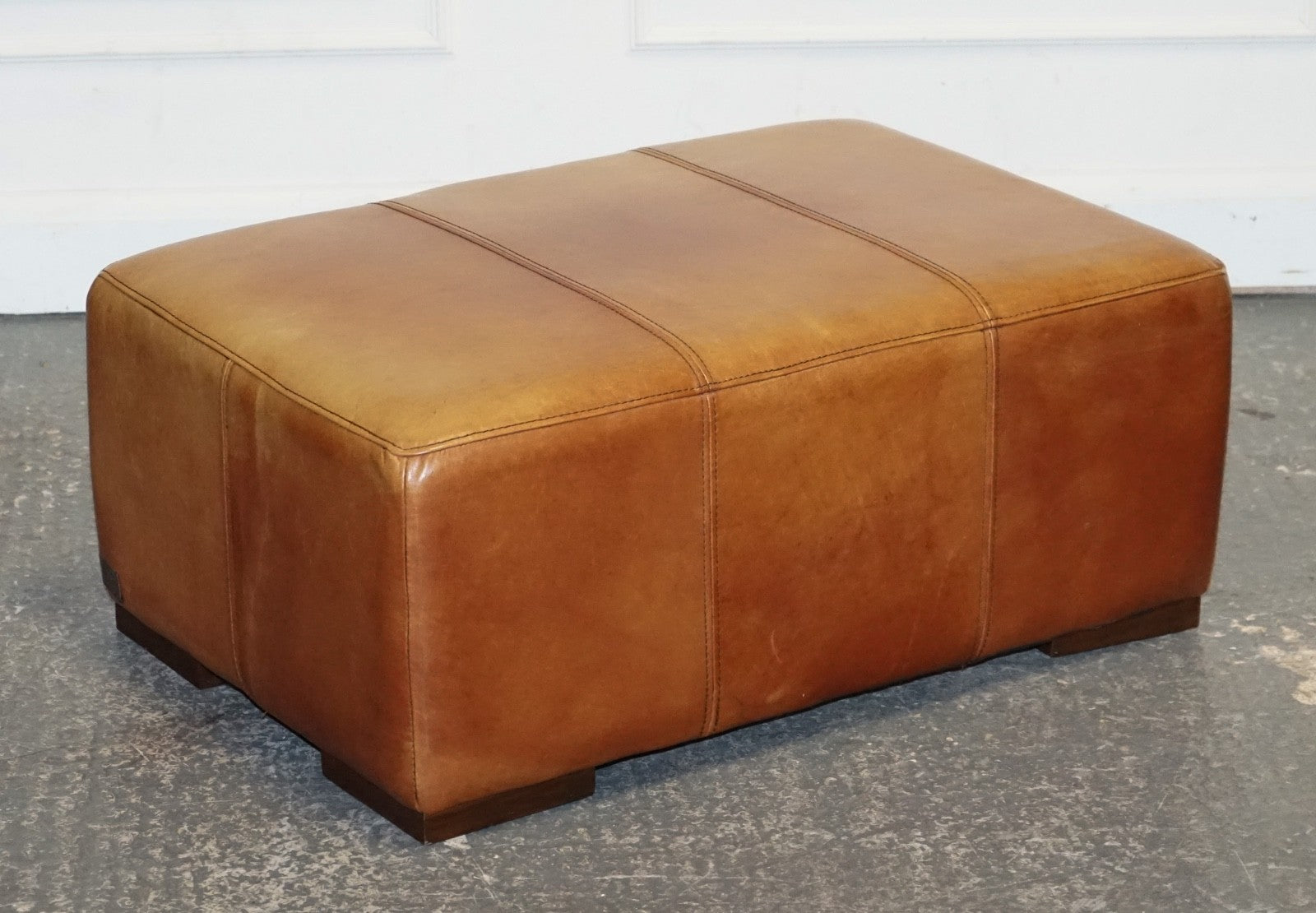 VINTAGE LARGE TAN LEATHER FOOTSTOOL OTTOMAN MADE BY HALO