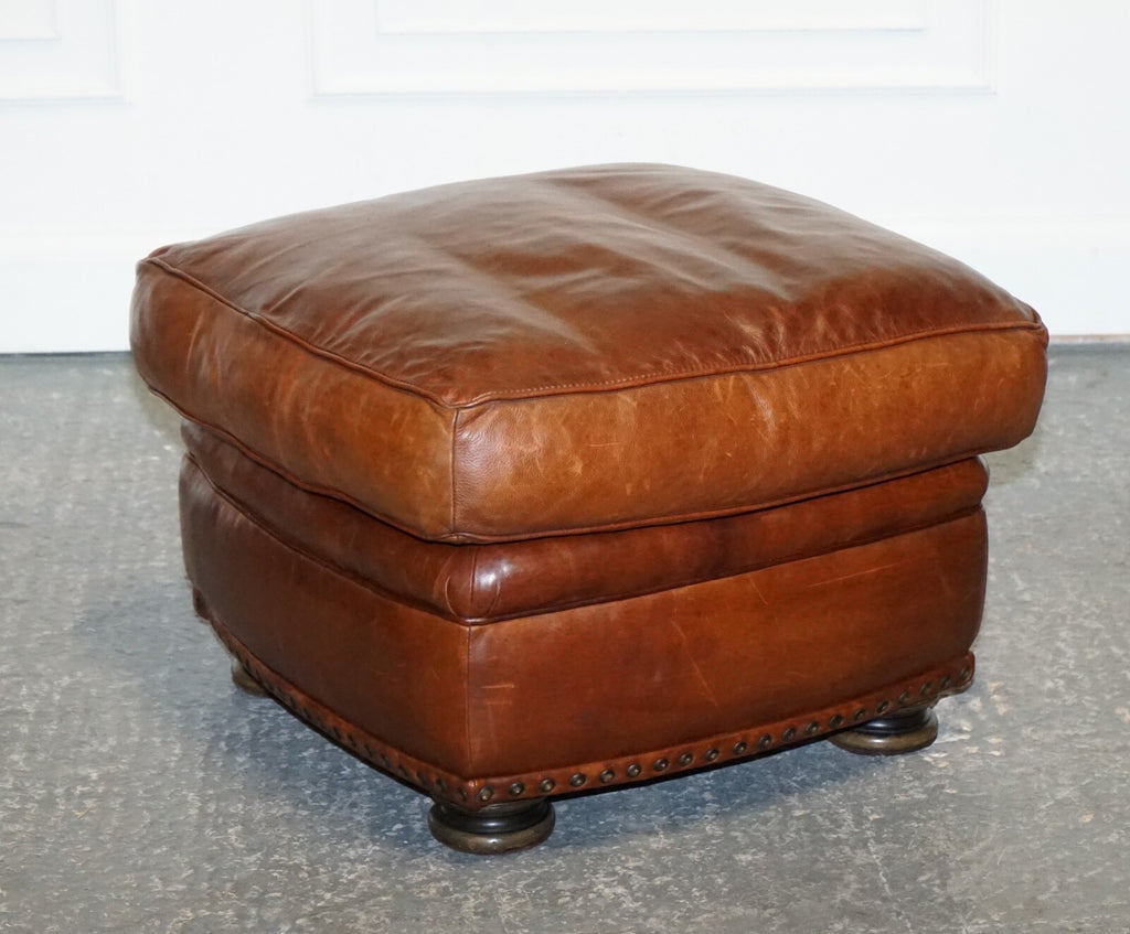 LOVELY VINTAGE BROWN LEATHER FOOTSTOOL FEATHER FILLED BRASS STUDS DETAIL