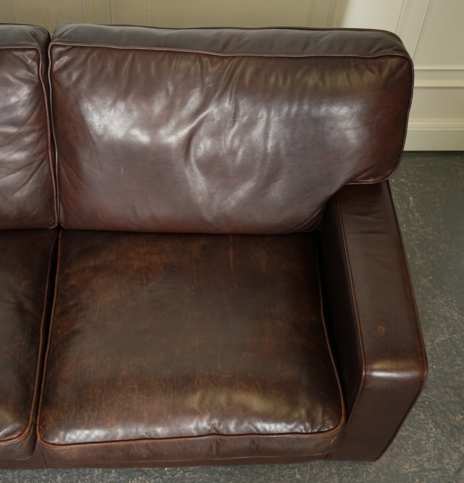 VINTAGE DISTRESSED BROWN LEATHER TWO TO THREE SEATER SOFA