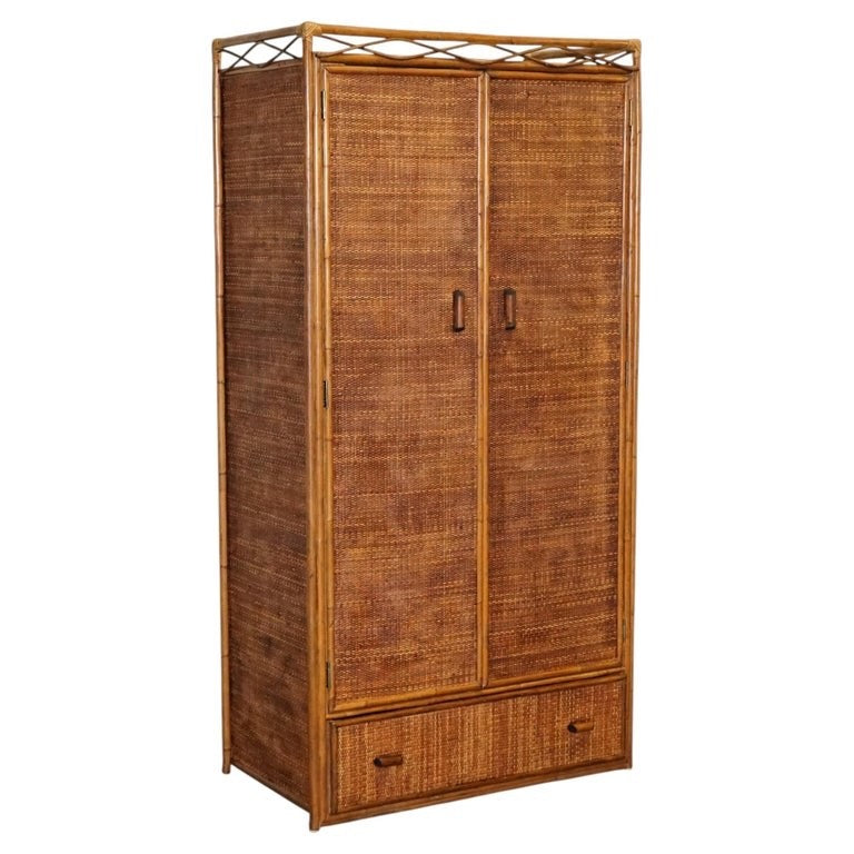 VINTAGE RATTAN AND CANE TWO DOOR AMOIRE OR WARDROBE WITH ONE DRAWER