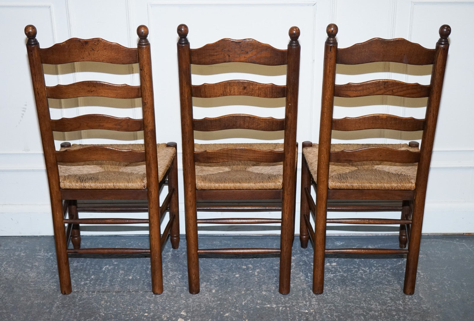 SET OF SIX ANTIQUE ENGLISH 19TH CENTURY LADDERBACK RUSH SEAT DINING CHAIRS
