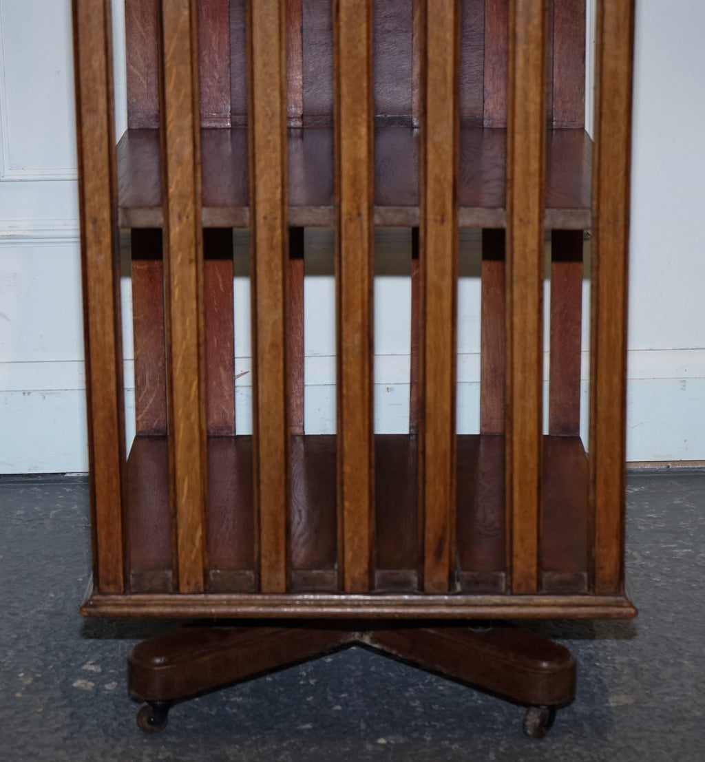 ANTIQUE SUBSTANTIAL OAK REVOLVING BOOKCASE WITH FOLDING READING STAND