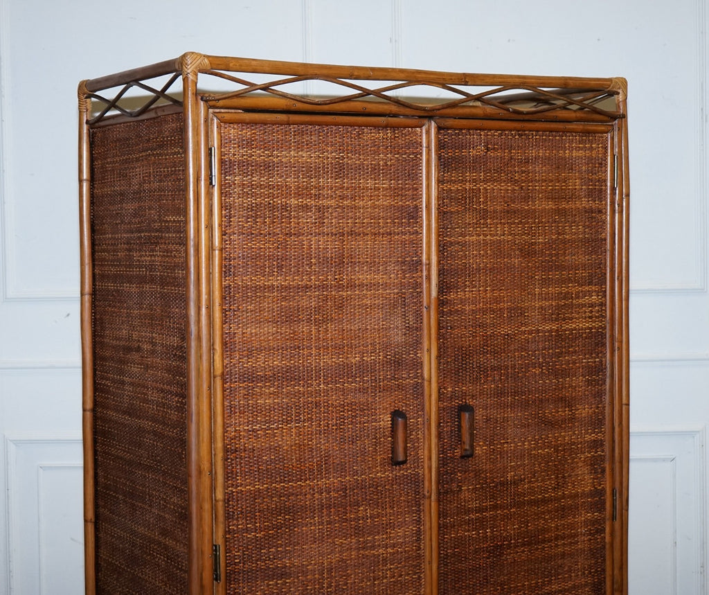 VINTAGE RATTAN AND CANE TWO DOOR AMOIRE OR WARDROBE WITH ONE DRAWER