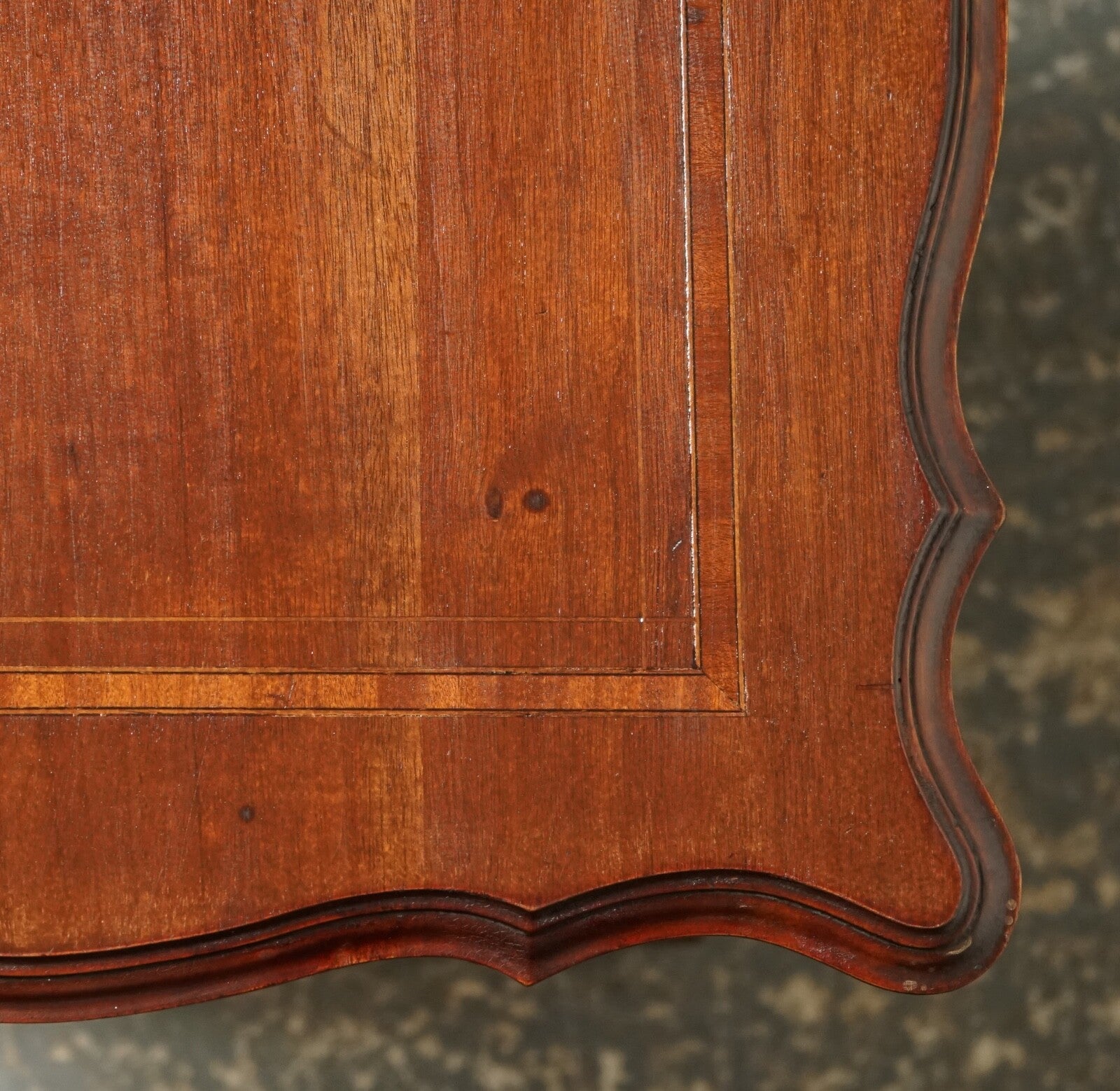 ANTIQUE EDWARDIAN REVOLVING BOOKCASE WITH A SERPENTINE SHAPED TOP