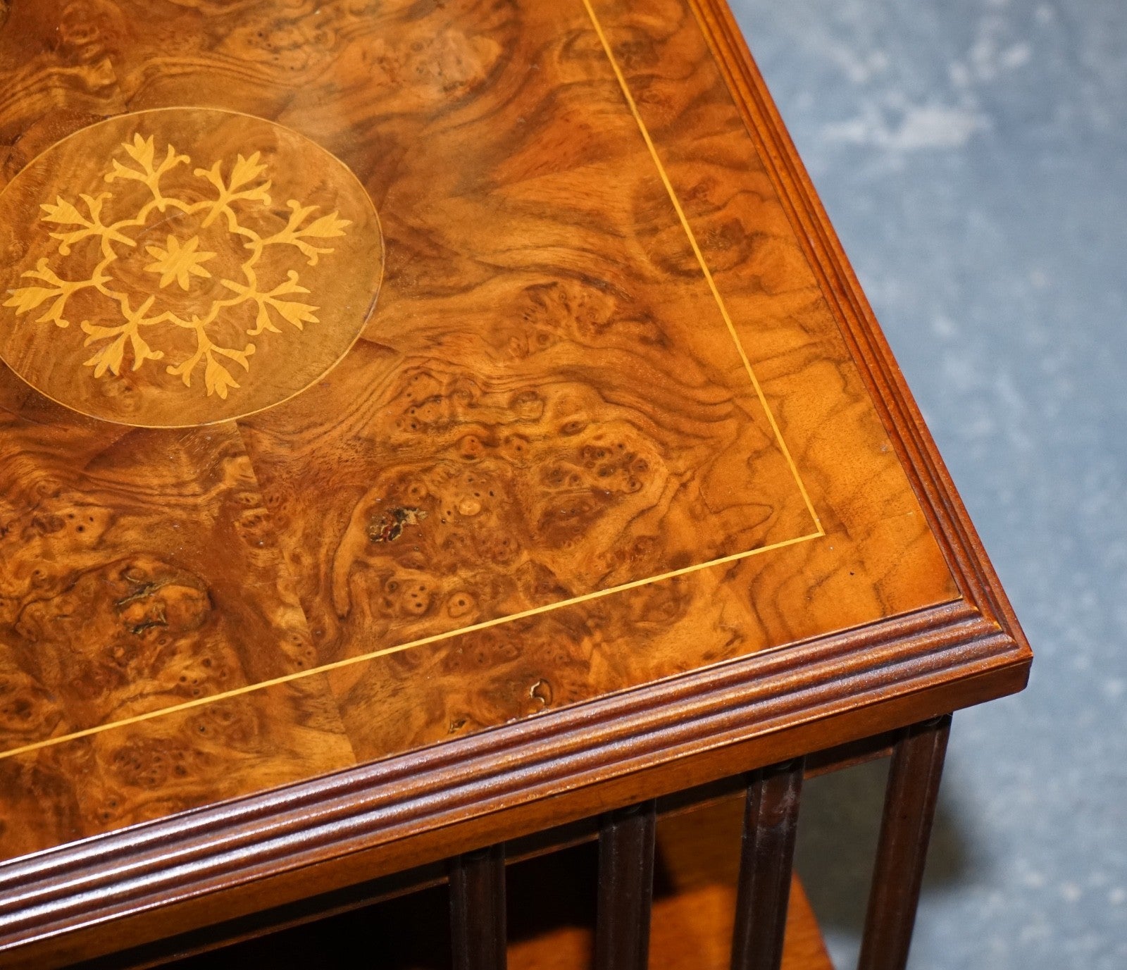 VINTAGE BURR WALNUT TOP REVOLVING BOOKCASE RAISED ON CASTORS
