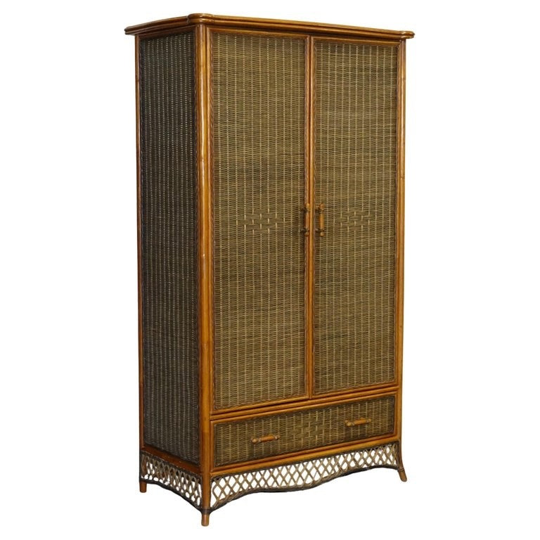 CIRCA 1970'S WOVEN WICKER ARMOIRE WARDROBE WiTH ONE DRAWER (1/2)