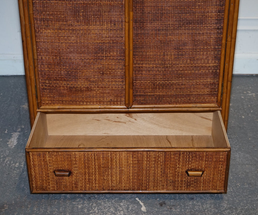 VINTAGE RATTAN AND CANE TWO DOOR AMOIRE OR WARDROBE WITH ONE DRAWER