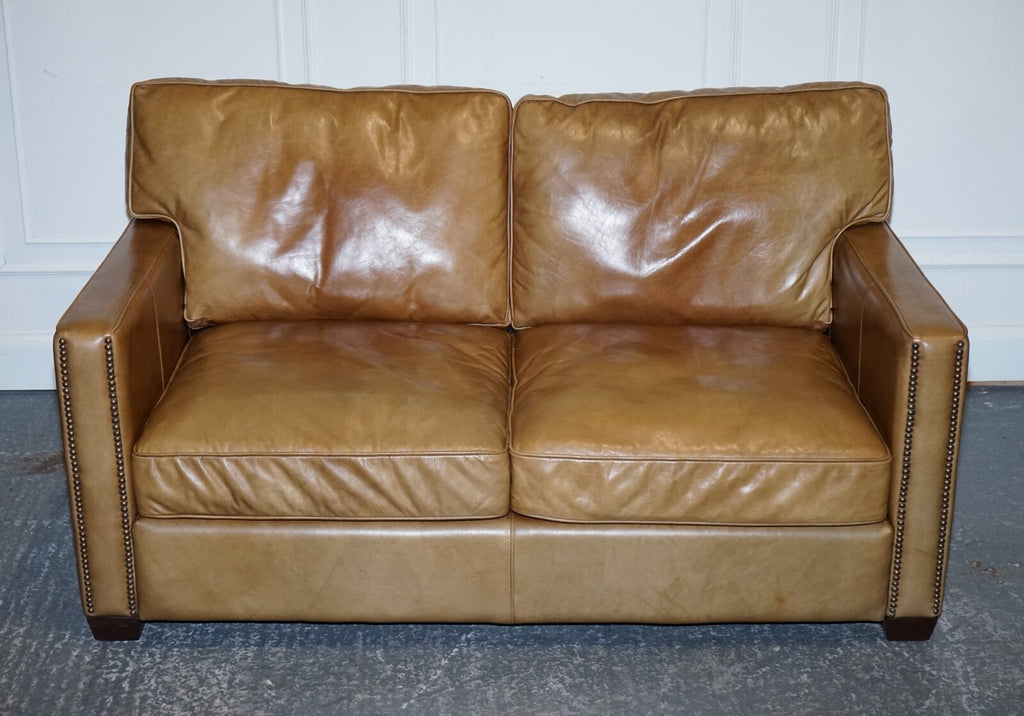 TIMOTHY OULTON HALO TWO SEATER VISCOUNT TAN LEATHER SOFA (1/2)