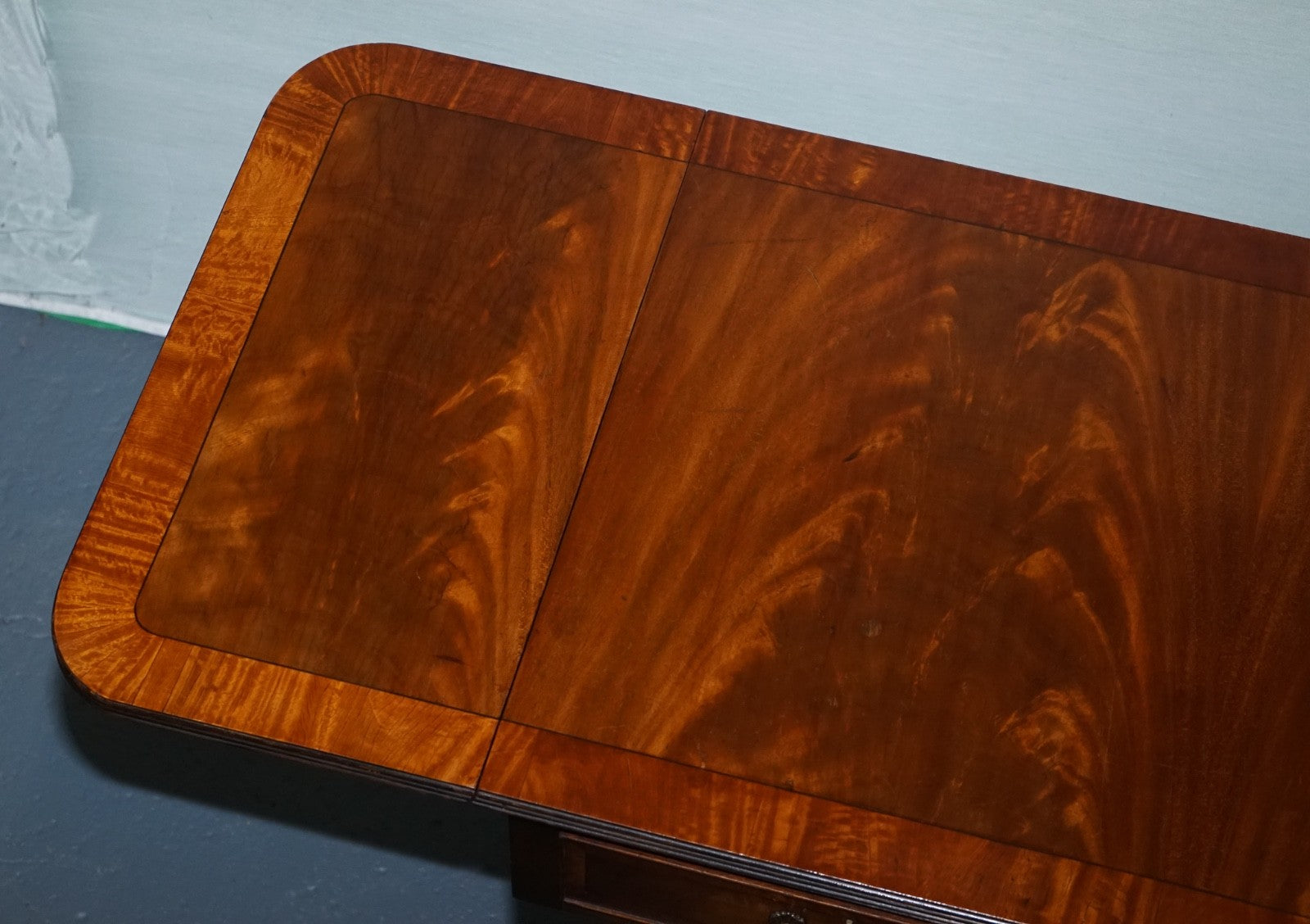 VINTAGE HARDWOOD DROP LEAF SIDE TABLE WITH SABER LEGS AND BRASS PAW FEET