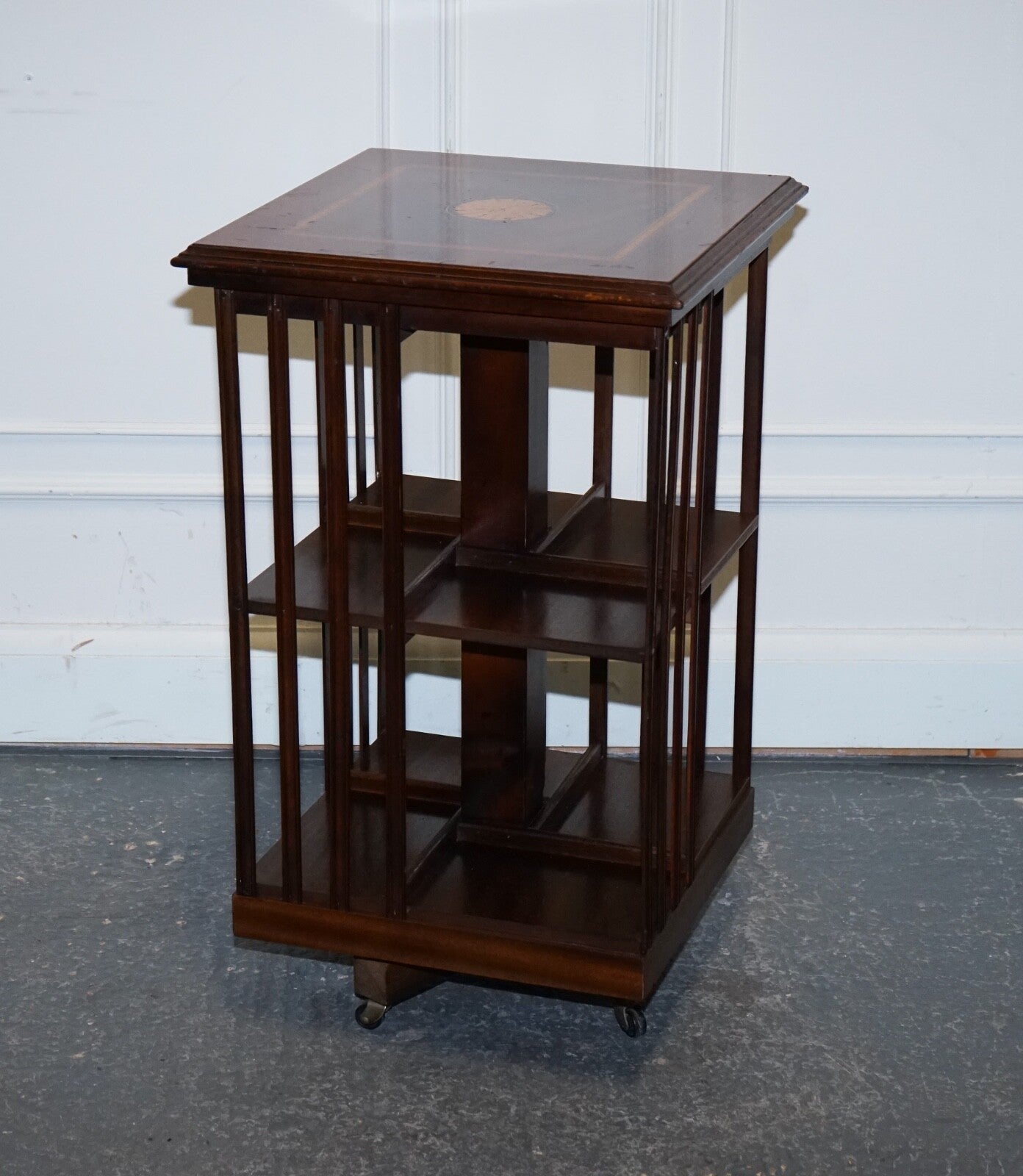MID CENTRY SHERATON REVIVAL INLAID REVOLVING BOOKCASE END TABLE ON CASTORS