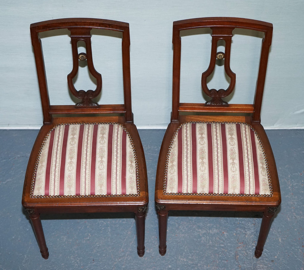 PAIR OF VINTAGE HARDWOOD DINING CHAIRS