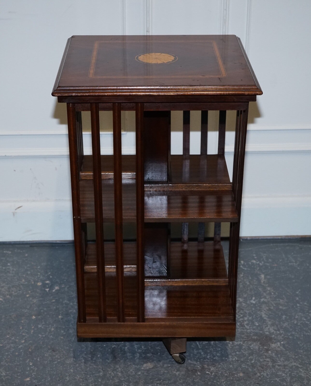 MID CENTRY SHERATON REVIVAL INLAID REVOLVING BOOKCASE END TABLE ON CASTORS