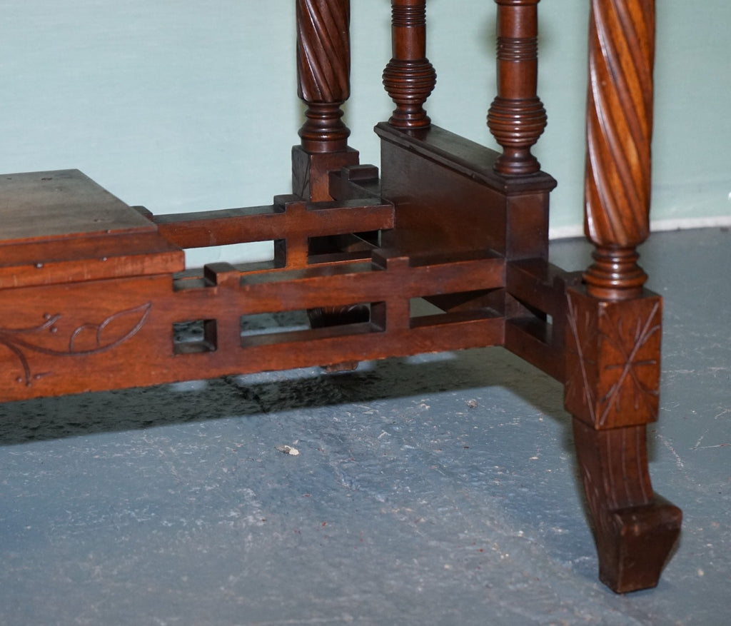 LATE 19TH CENTURY CONTINENTAL CARVED WALNUT WRITING TABLE LEATHER INLAY TOP