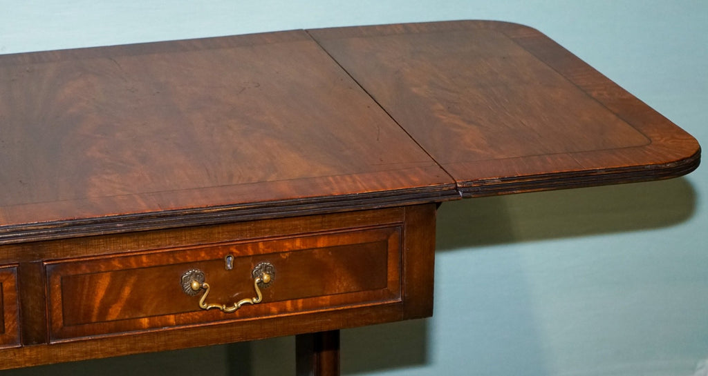 VINTAGE HARDWOOD DROP LEAF SIDE TABLE WITH SABER LEGS AND BRASS PAW FEET
