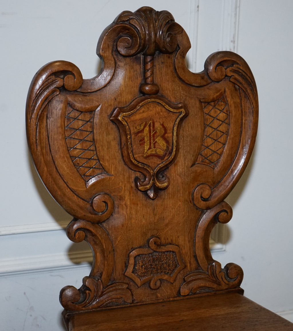 ANTIQUE PAIR OF VICTORIAN SOLID OAK CARVED HALLWAY CHAIRS WITH LION PAW FEET