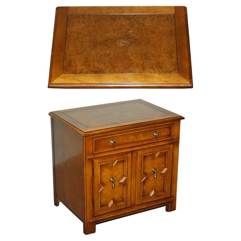 BAKER FURNITURE BURR WALNUT BEDSIDE CABINET WITH DRAWER AND CARVED DOORS