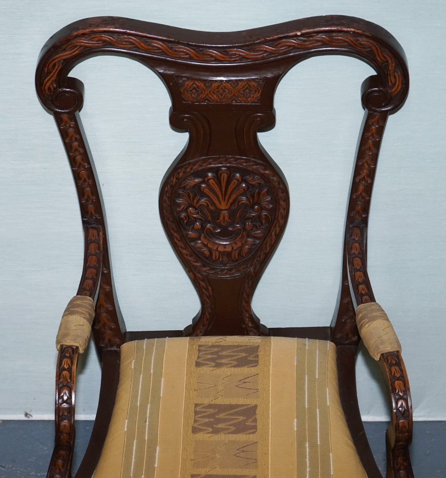 ANGLO INDIAN WOODEN HEAVILY CARVED ELEPHANT DETAIL SINGLE CAVER ARMCHAIR