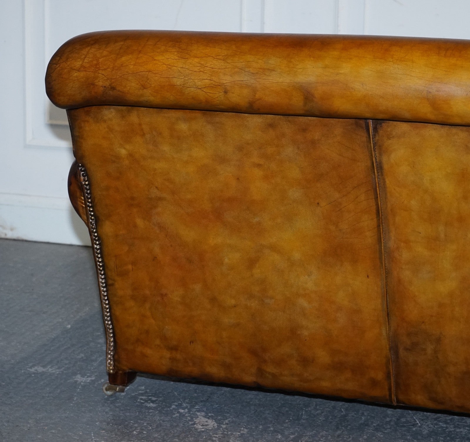ENGLISH RESTORED HAND DYED LEATHER TWO TO THREE SEATER SOFA