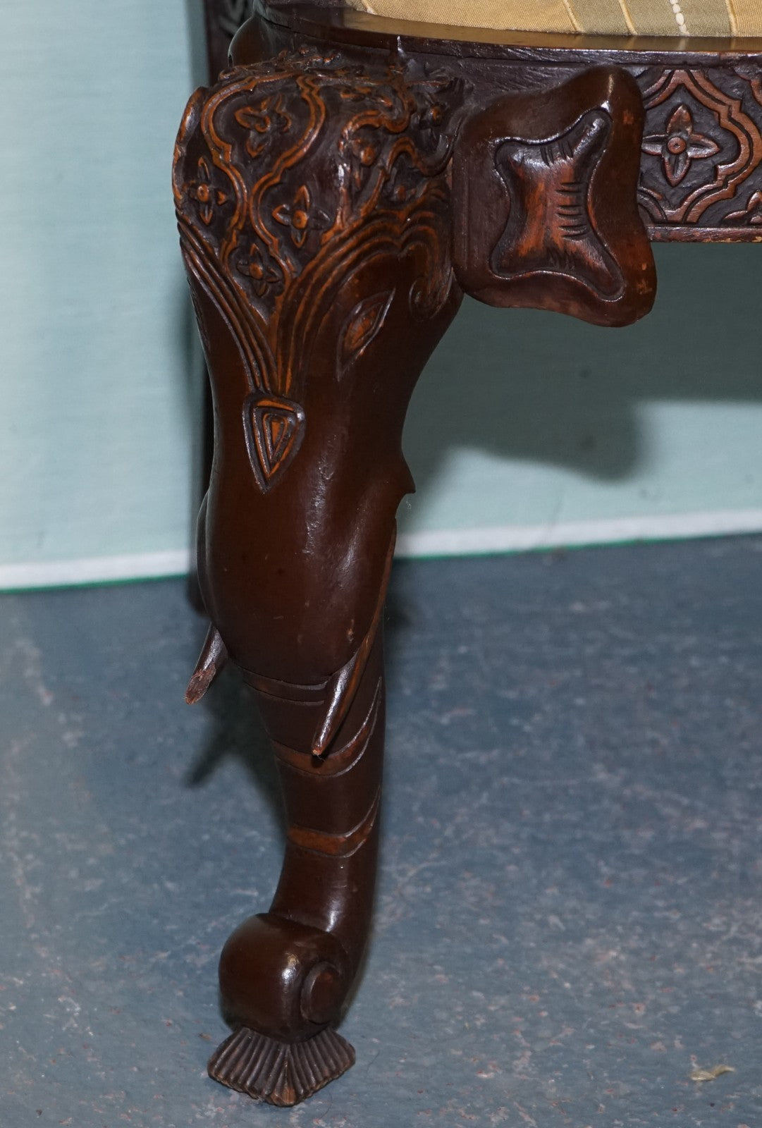 ANGLO INDIAN WOODEN HEAVILY CARVED ELEPHANT DETAIL SINGLE CAVER ARMCHAIR