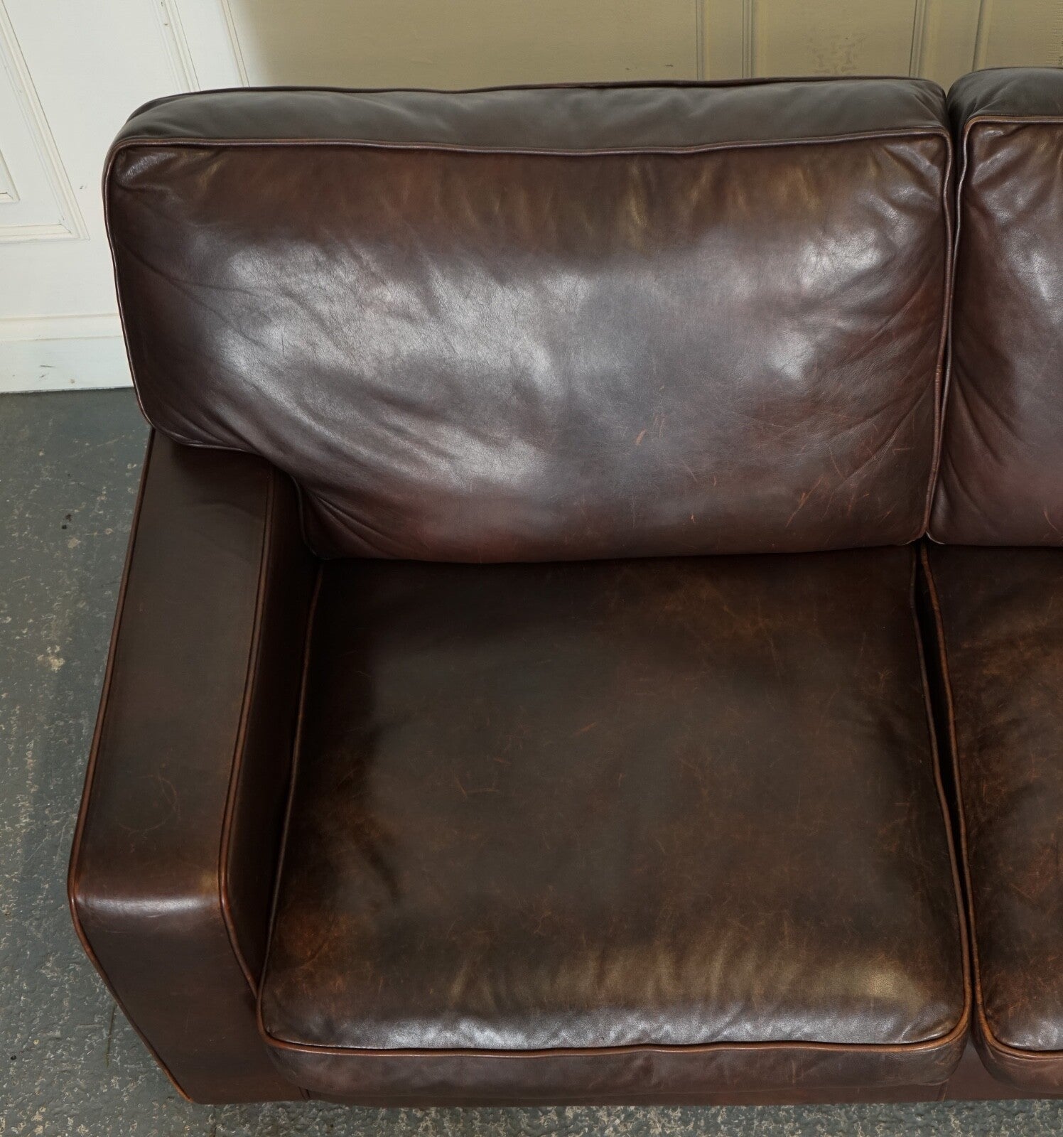 VINTAGE DISTRESSED BROWN LEATHER TWO TO THREE SEATER SOFA