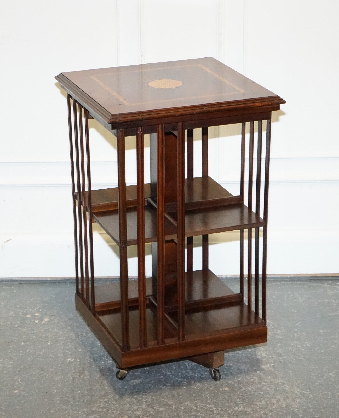 MID CENTRY SHERATON REVIVAL INLAID REVOLVING BOOKCASE END TABLE ON CASTORS