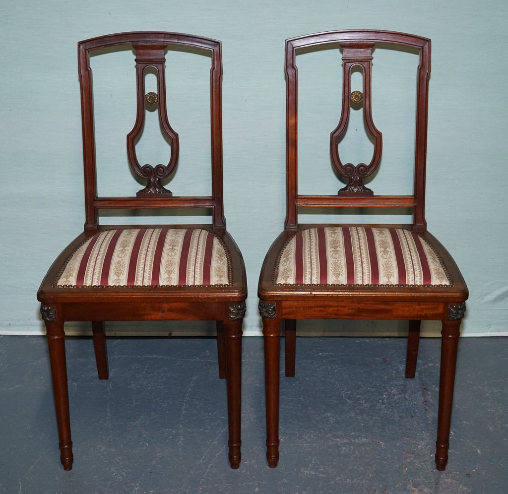 PAIR OF VINTAGE HARDWOOD DINING CHAIRS
