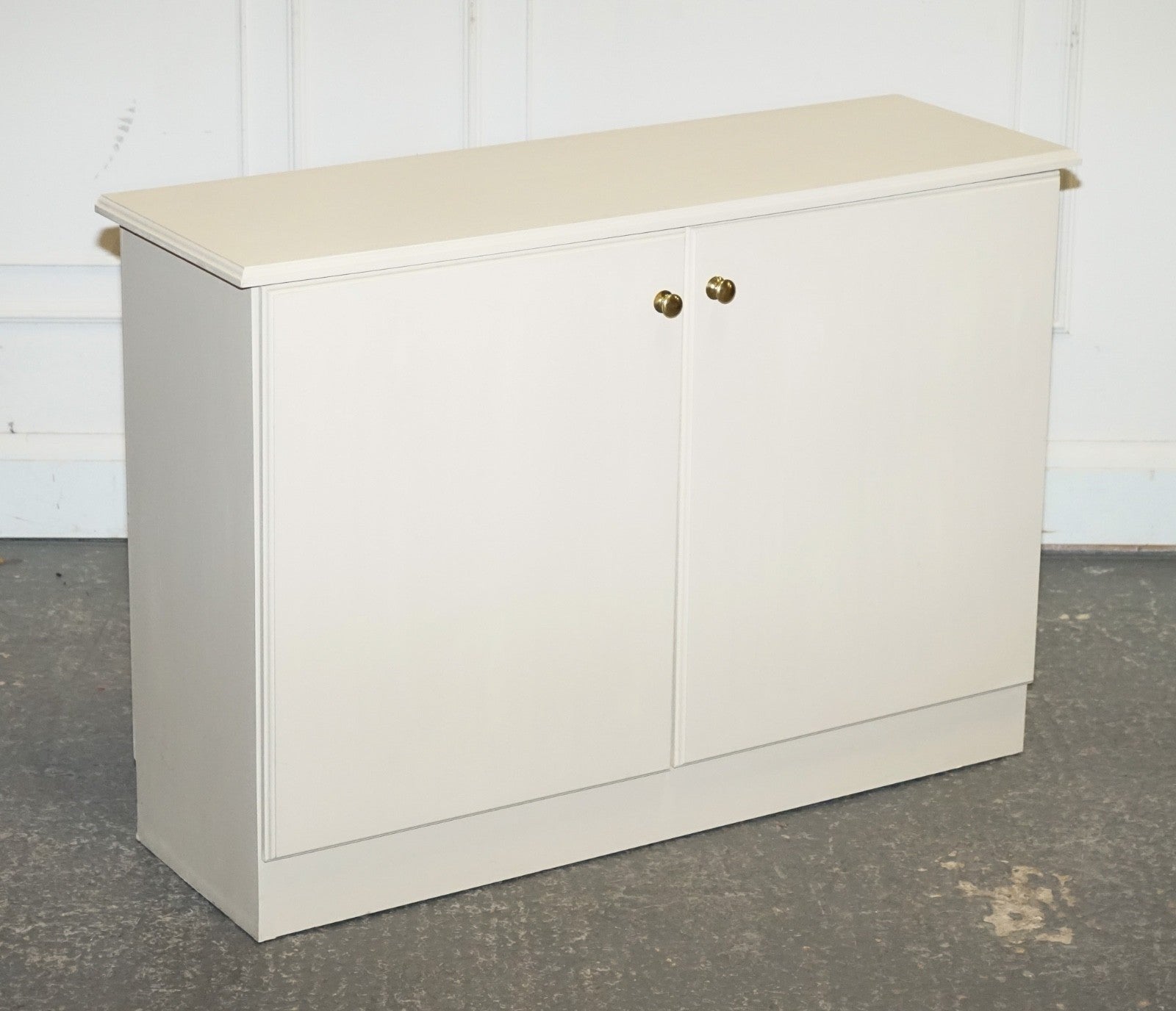 MINIMALIST PAINTED WHITE CUPBOARD WITH BRASS KNOBS MATCHING TABLES AVAILABLE