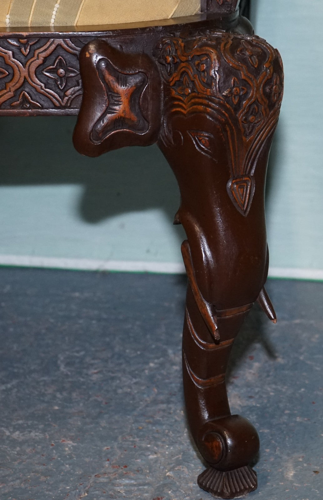 ANGLO INDIAN WOODEN HEAVILY CARVED ELEPHANT DETAIL SINGLE CAVER ARMCHAIR
