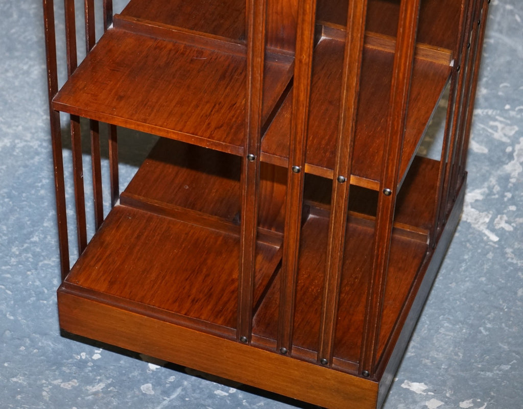 VINTAGE BURR WALNUT TOP REVOLVING BOOKCASE RAISED ON CASTORS