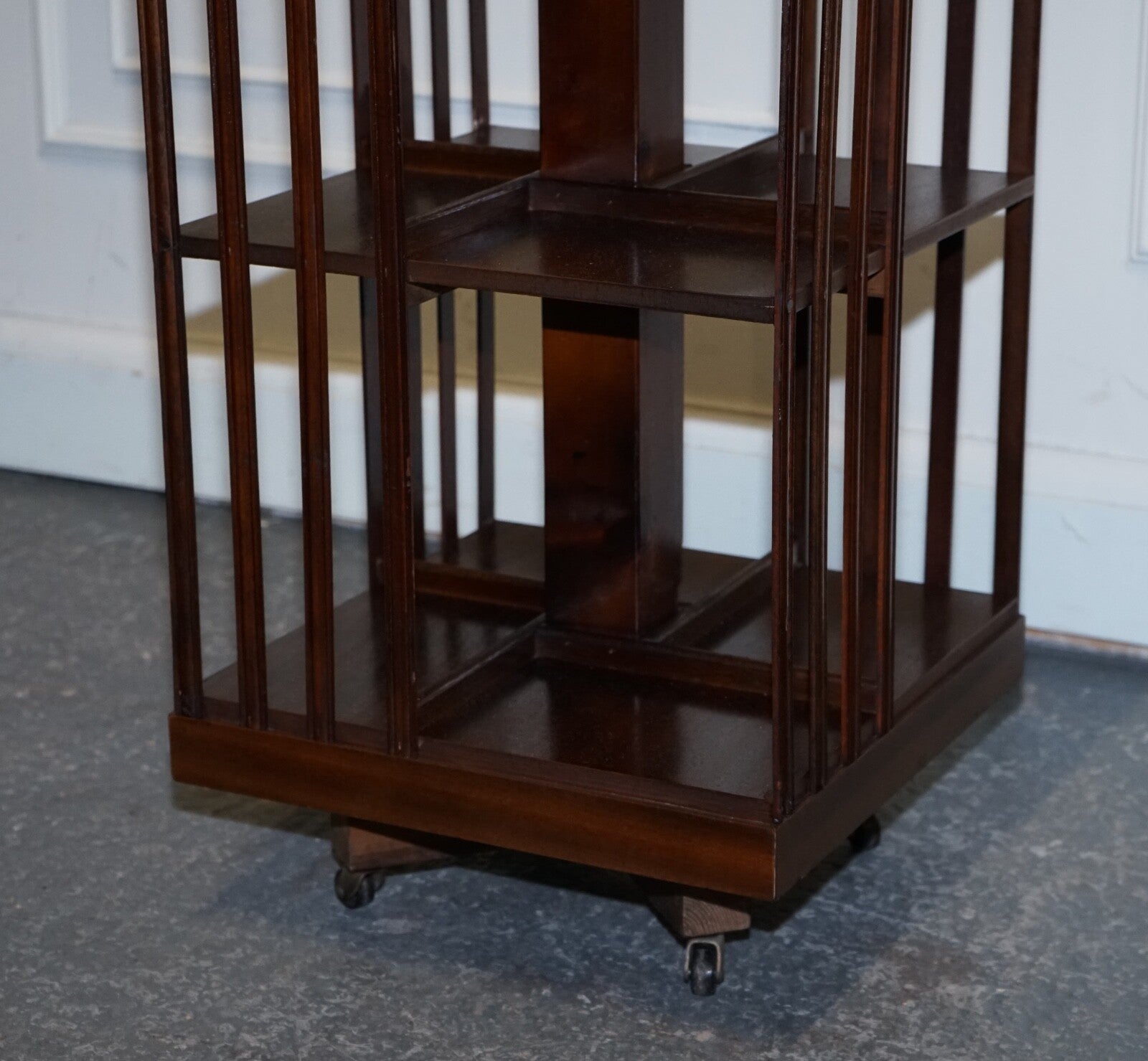MID CENTRY SHERATON REVIVAL INLAID REVOLVING BOOKCASE END TABLE ON CASTORS