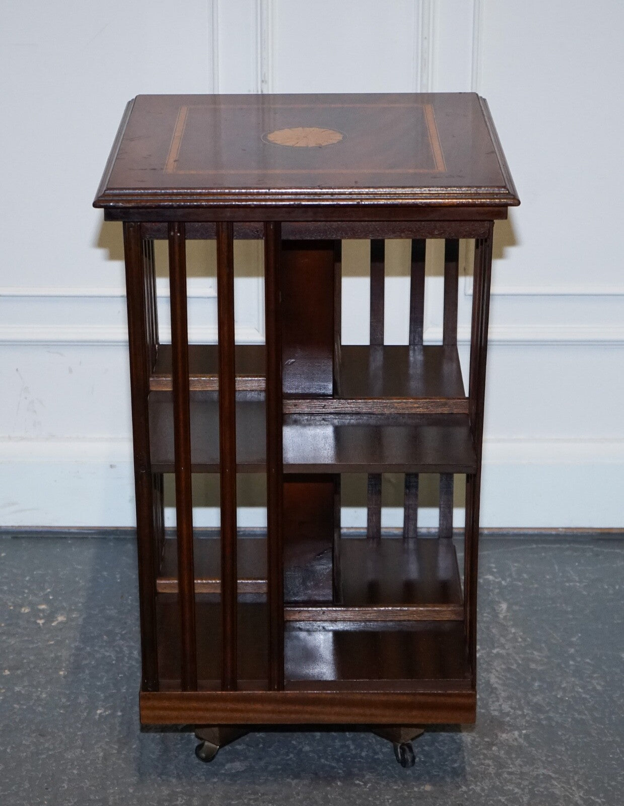 MID CENTRY SHERATON REVIVAL INLAID REVOLVING BOOKCASE END TABLE ON CASTORS