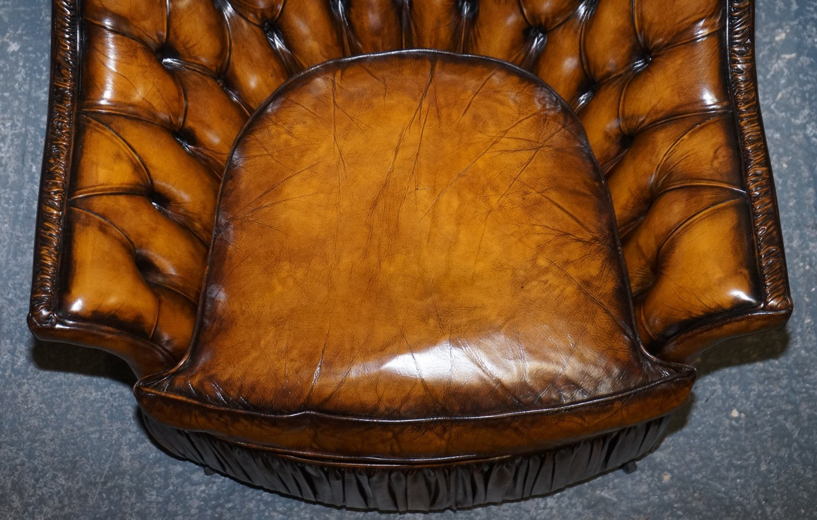 RARE PAIR OF BROWN HAND DYED LEATHER CHESTERFIELD ARMCHAIRS WITH PLEATED FRONT