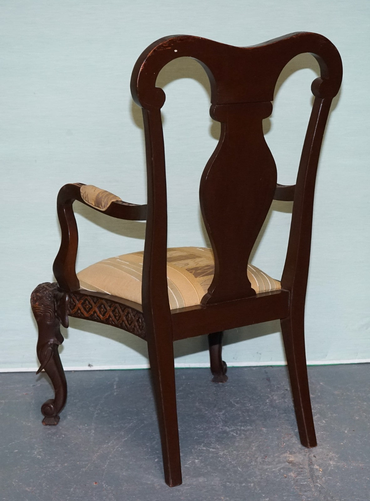 ANGLO INDIAN WOODEN HEAVILY CARVED ELEPHANT DETAIL SINGLE CAVER ARMCHAIR