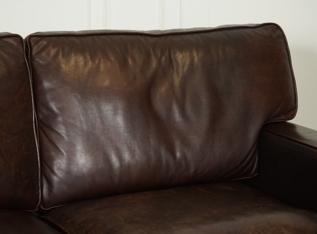 VINTAGE DISTRESSED BROWN LEATHER TWO TO THREE SEATER SOFA