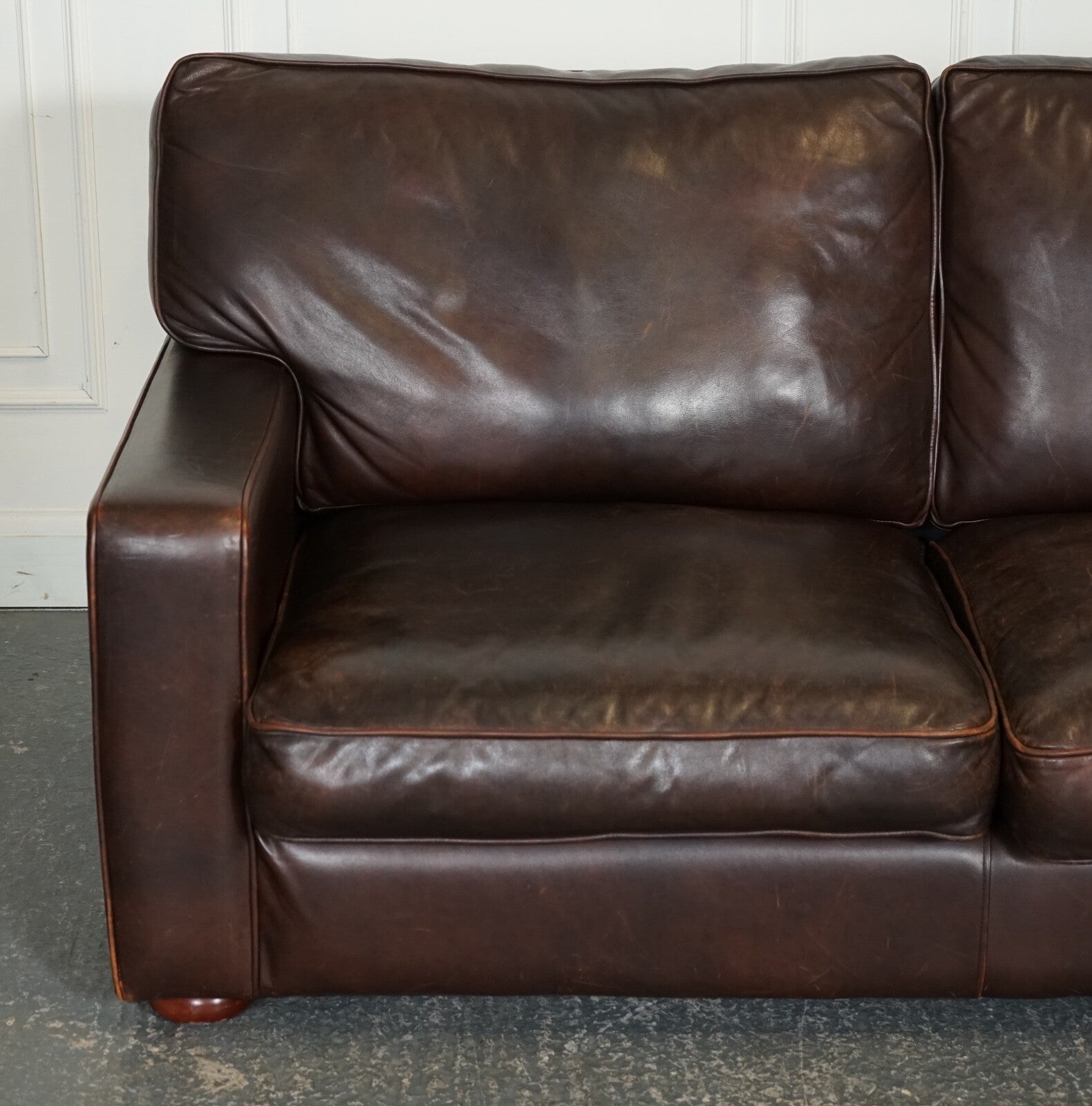 VINTAGE DISTRESSED BROWN LEATHER TWO TO THREE SEATER SOFA