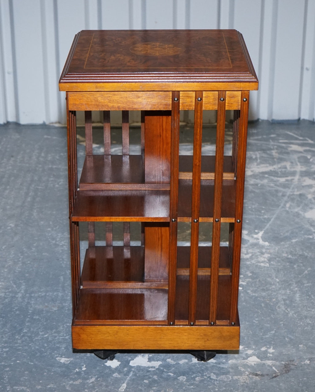 VINTAGE BURR WALNUT TOP REVOLVING BOOKCASE RAISED ON CASTORS