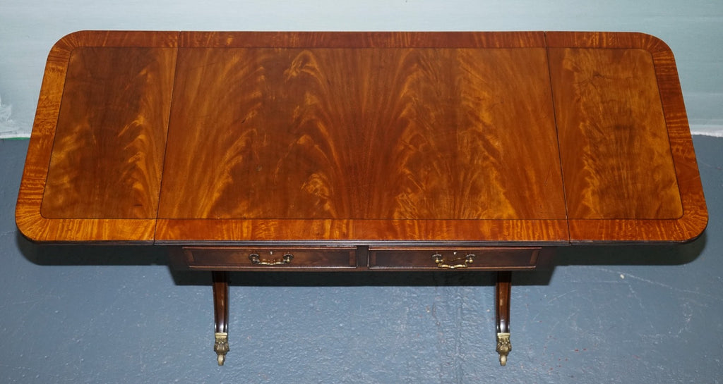 VINTAGE HARDWOOD DROP LEAF SIDE TABLE WITH SABER LEGS AND BRASS PAW FEET