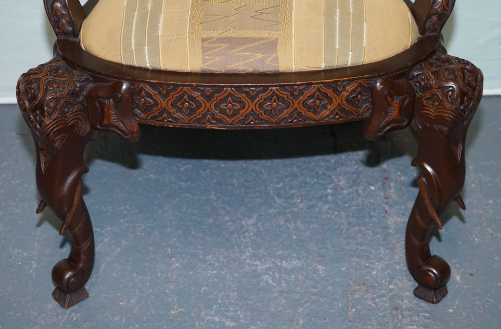 ANGLO INDIAN WOODEN HEAVILY CARVED ELEPHANT DETAIL SINGLE CAVER ARMCHAIR