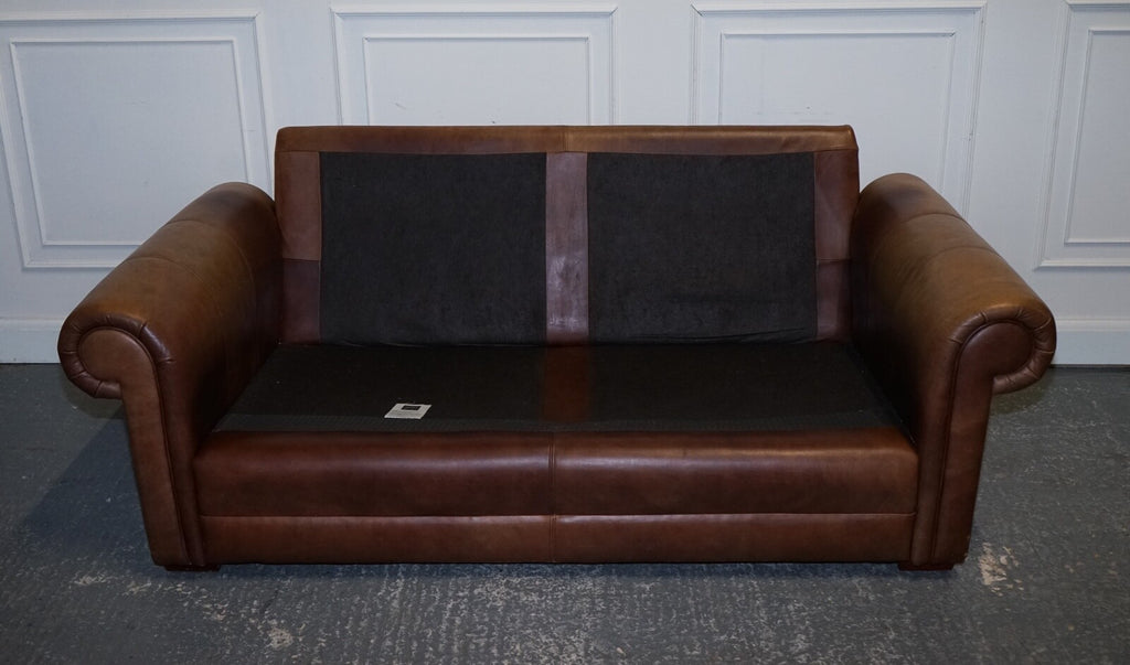 COMFORTABLE BROWN LEATHER TWO TO THREE SEATER SOFA WITH FEATHER BACK CUSHIONS