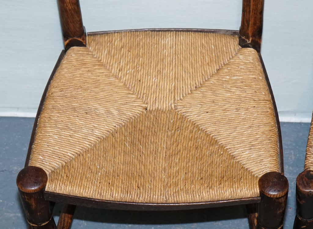 SET OF FOUR SOLID OAK COUNTRY HOUSE STRAW SEAT LADDER BACK DINING CHAIRS