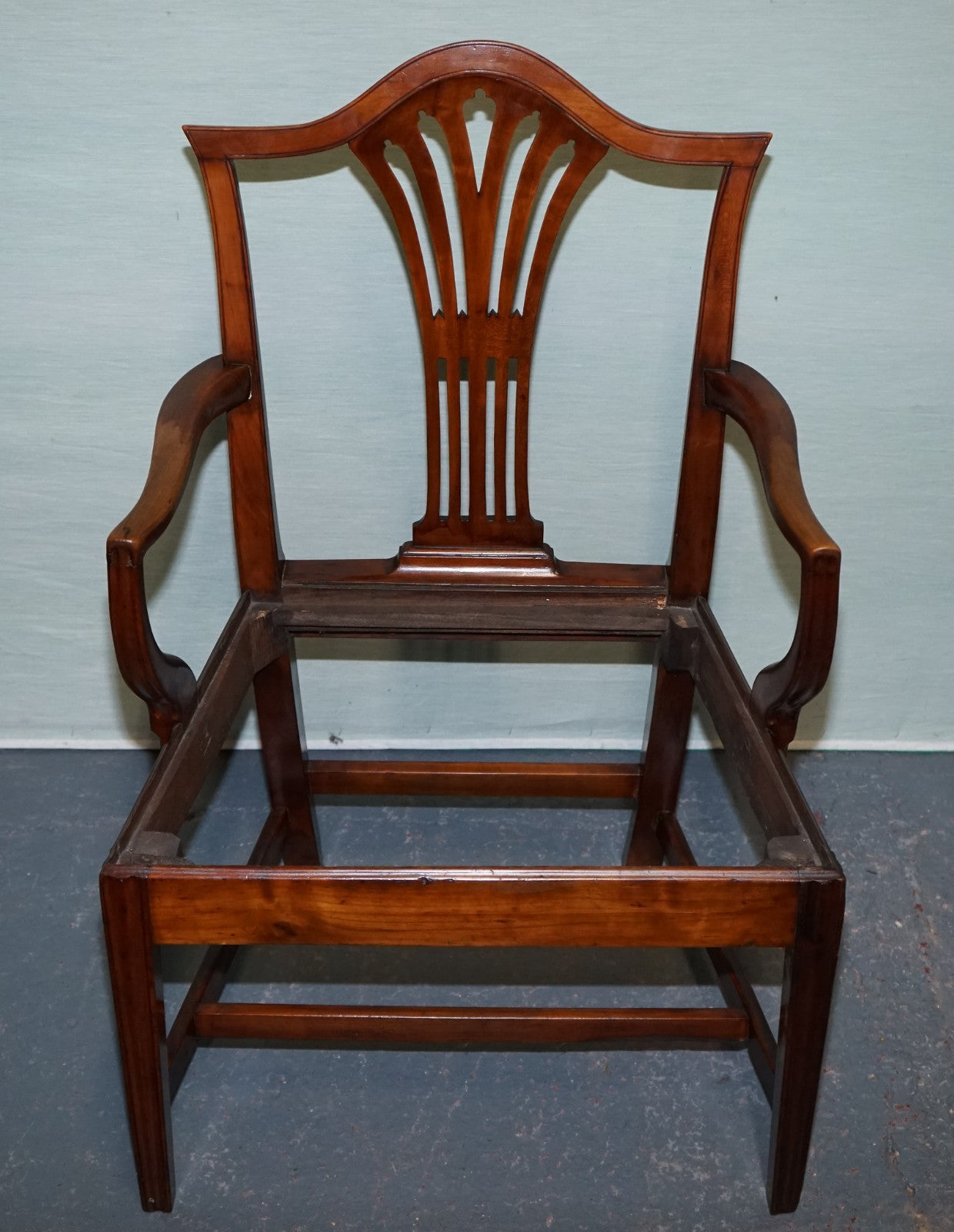 19TH CENTRY SINGLE HEPPLEWHITE ELBOW ARMCHAIR WITH FLORAL NEEDLEPOINT CUSHION